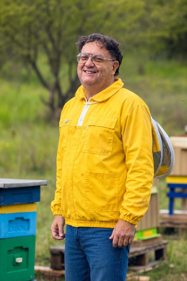 Alessandro Delfino, founder of Florabella, at the hives in Koziegłowy, Wielkopolska